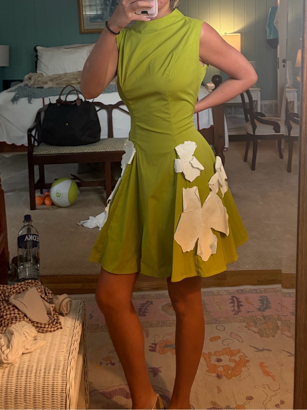 Green dress with floral appliqués